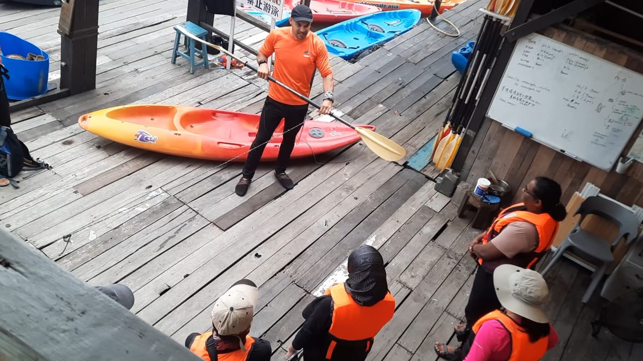 Students on Mangrove Tour receiving instruction